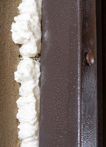 Foam-filled-the-gap-between-the-door-frame-and-the-wall